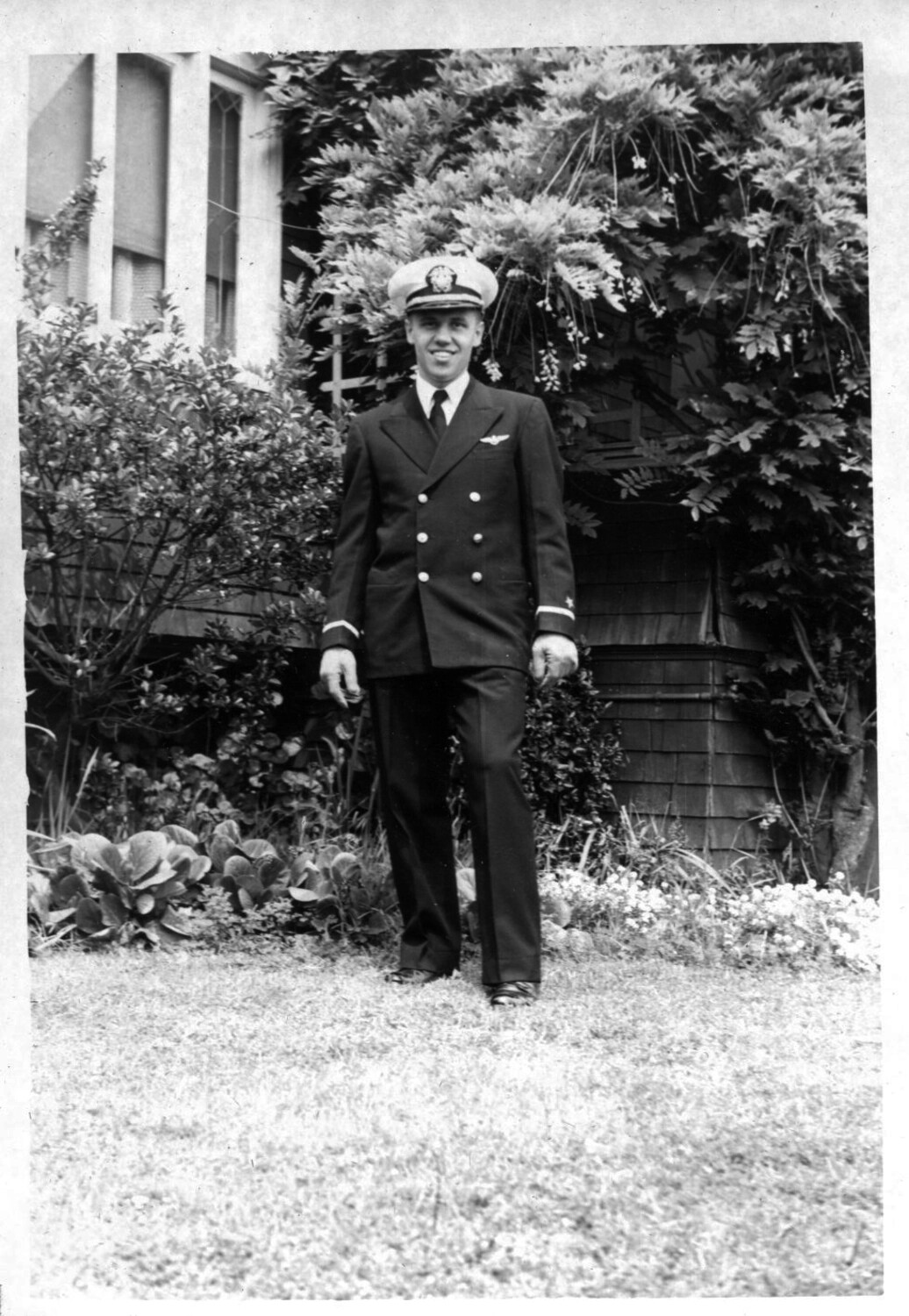 U.S. Navy Officer in Dress Blue Uniform with Aviator Wings, Home Garden Portrait, Korean War Era