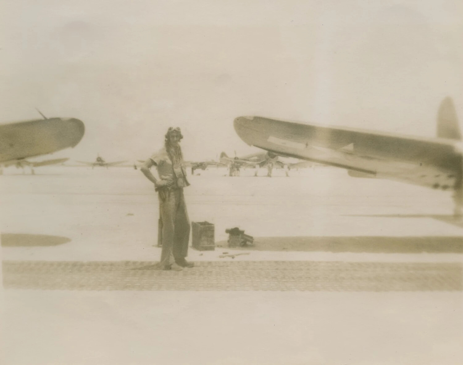 Naval Aviator Standing Among Parked Fighter Aircraft, McAleer Photo Album, WWII
