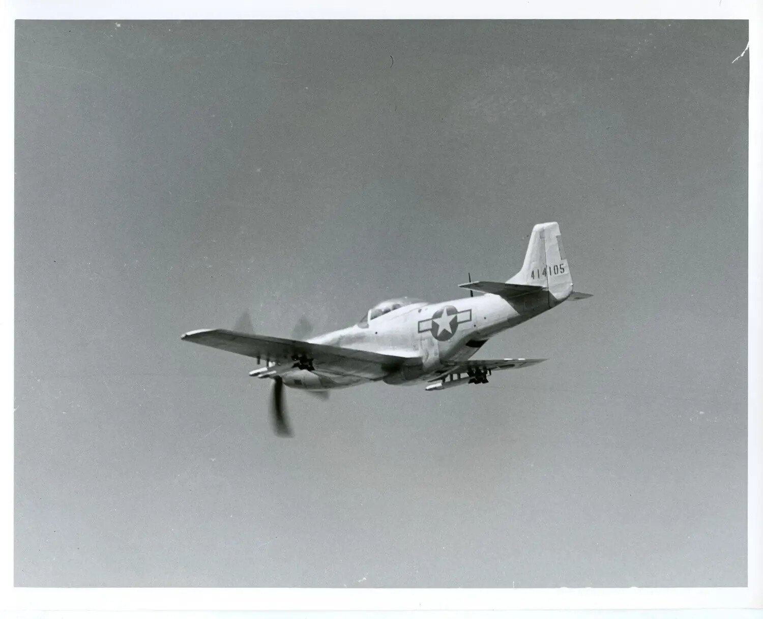 North American P-51 Mustang in Flight, Serial 414105, with External Drop Tanks