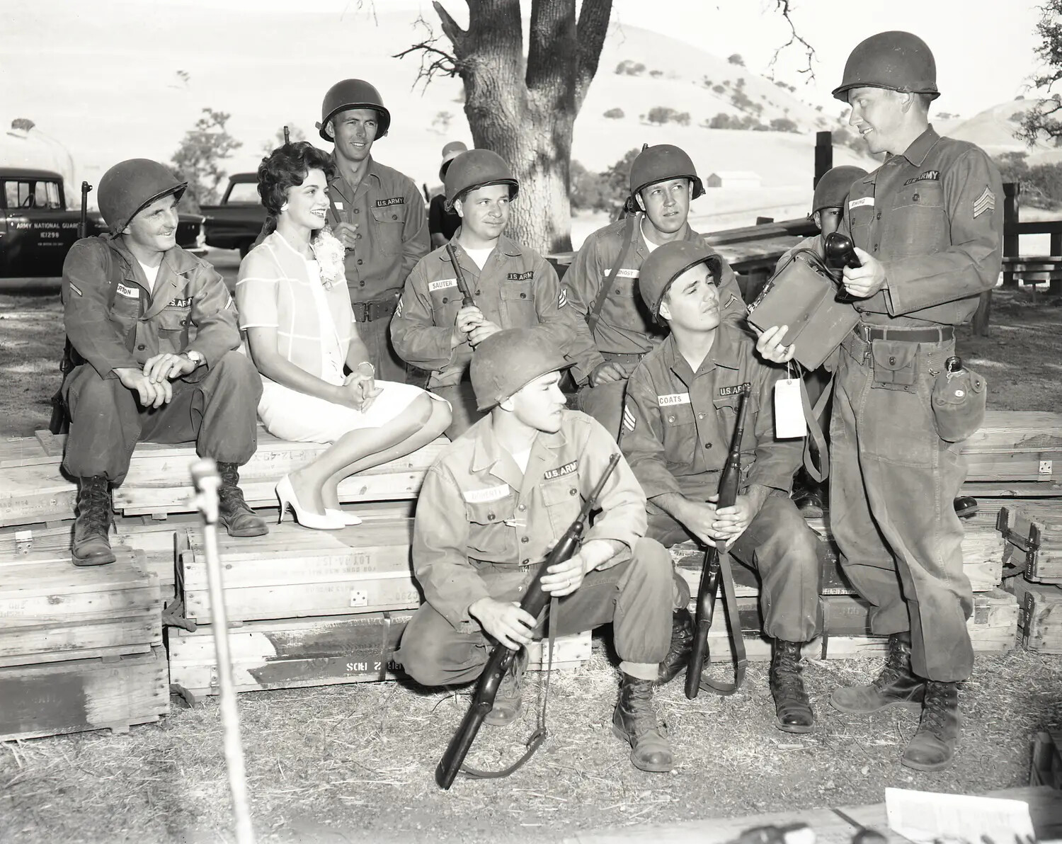 Miss California 1960 Suzanne Marie Reamo with Armed National Guard Soldiers at Field Equipment Display