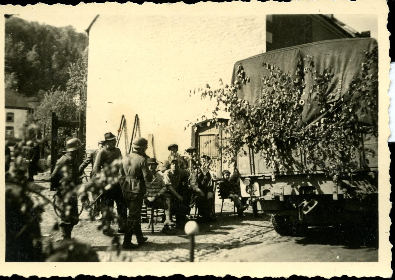 American GIs and Camouflaged Supply Truck, 11th Armored Division, European Theater, WWII