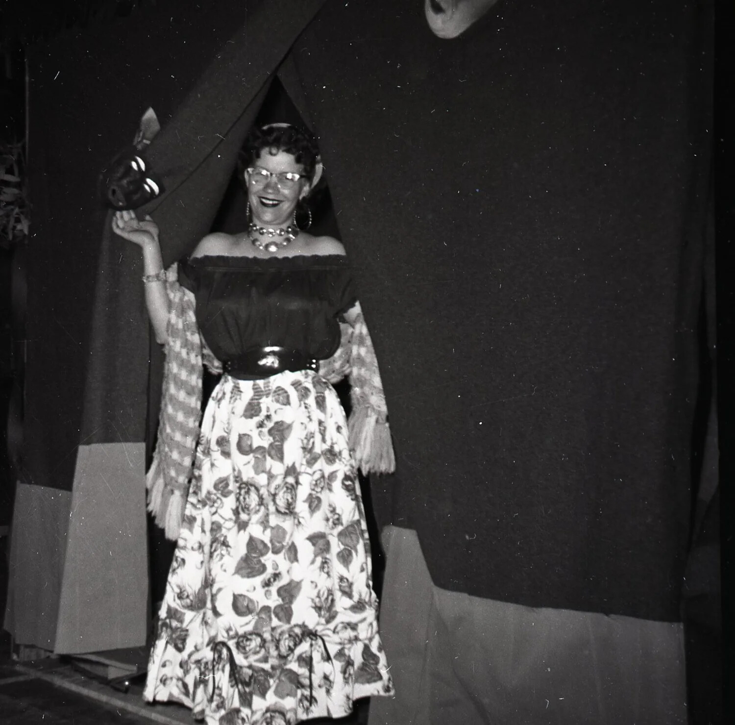 Woman in Fiesta Costume Emerging from Stage Curtain, Kelley Album