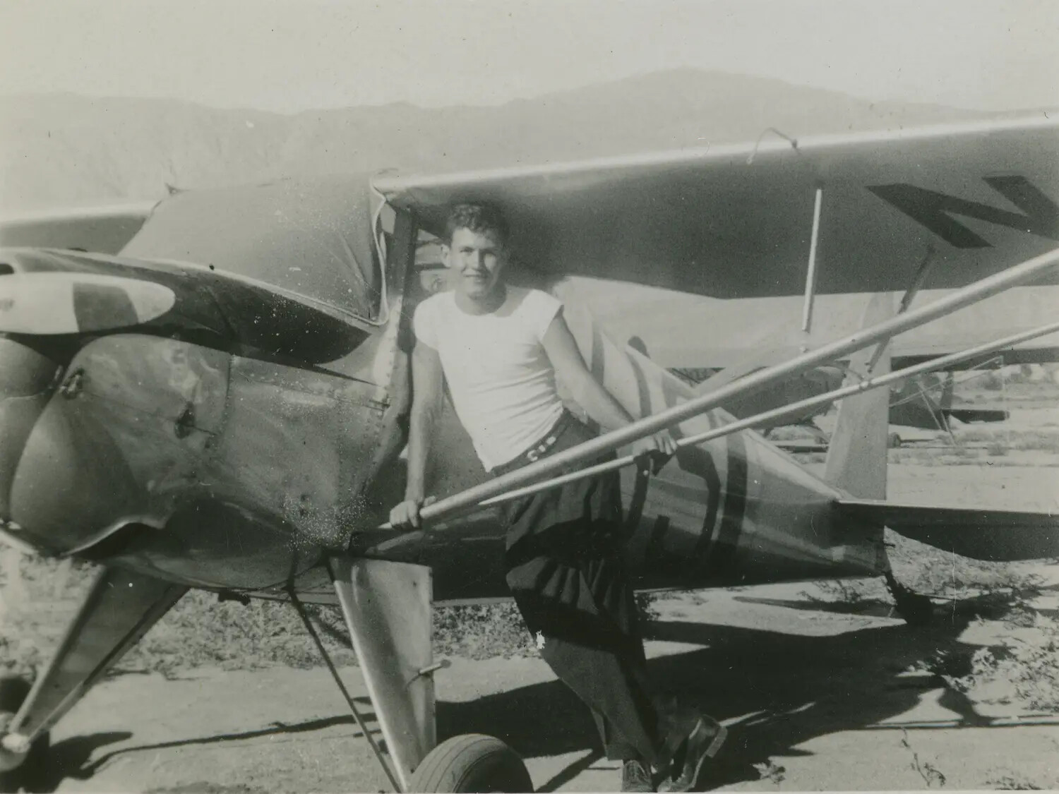 Young Man with Light Civilian Aircraft, Edward P. McAleer Photo Album