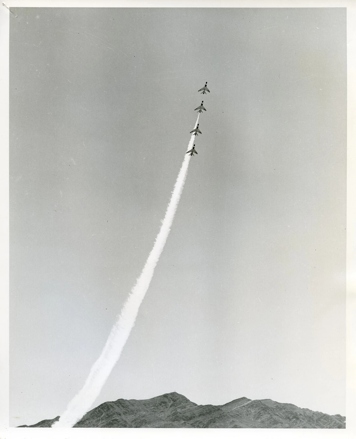 USAF Thunderbirds F-100 Super Sabres in Vertical Climb with Smoke Trail