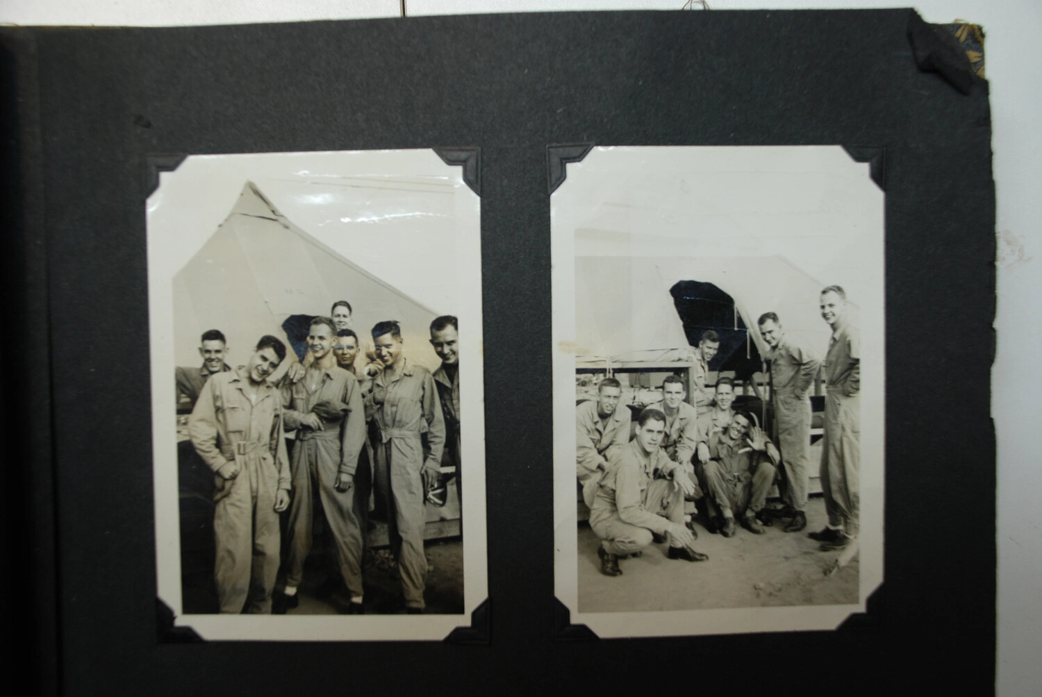 Group Portraits of Army Air Forces Airmen in Coveralls Before Aircraft Tail Section, WWII Era