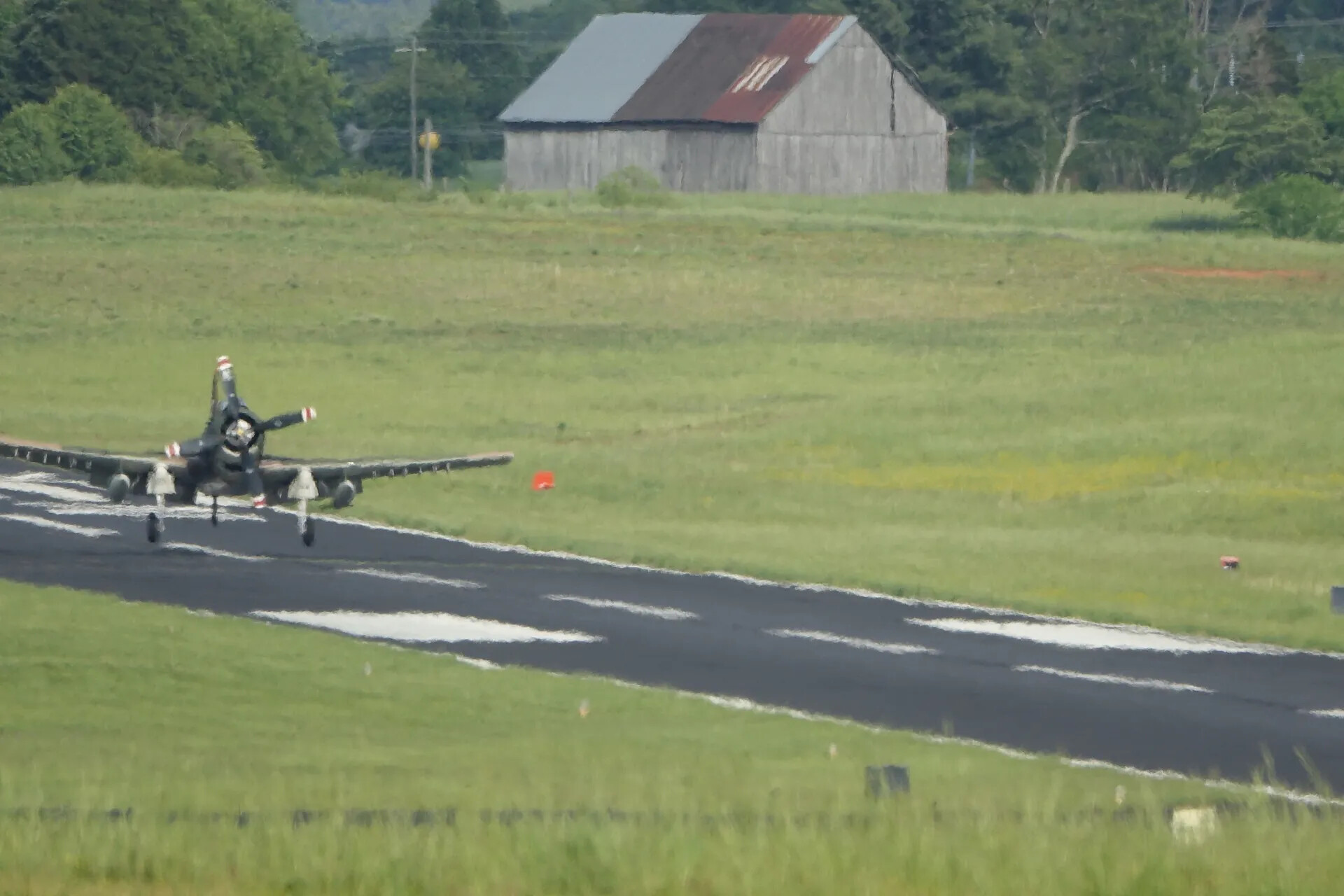 Restored Douglas A-1 Skyraider on Takeoff/Landing Roll, Rural Airstrip, 2019