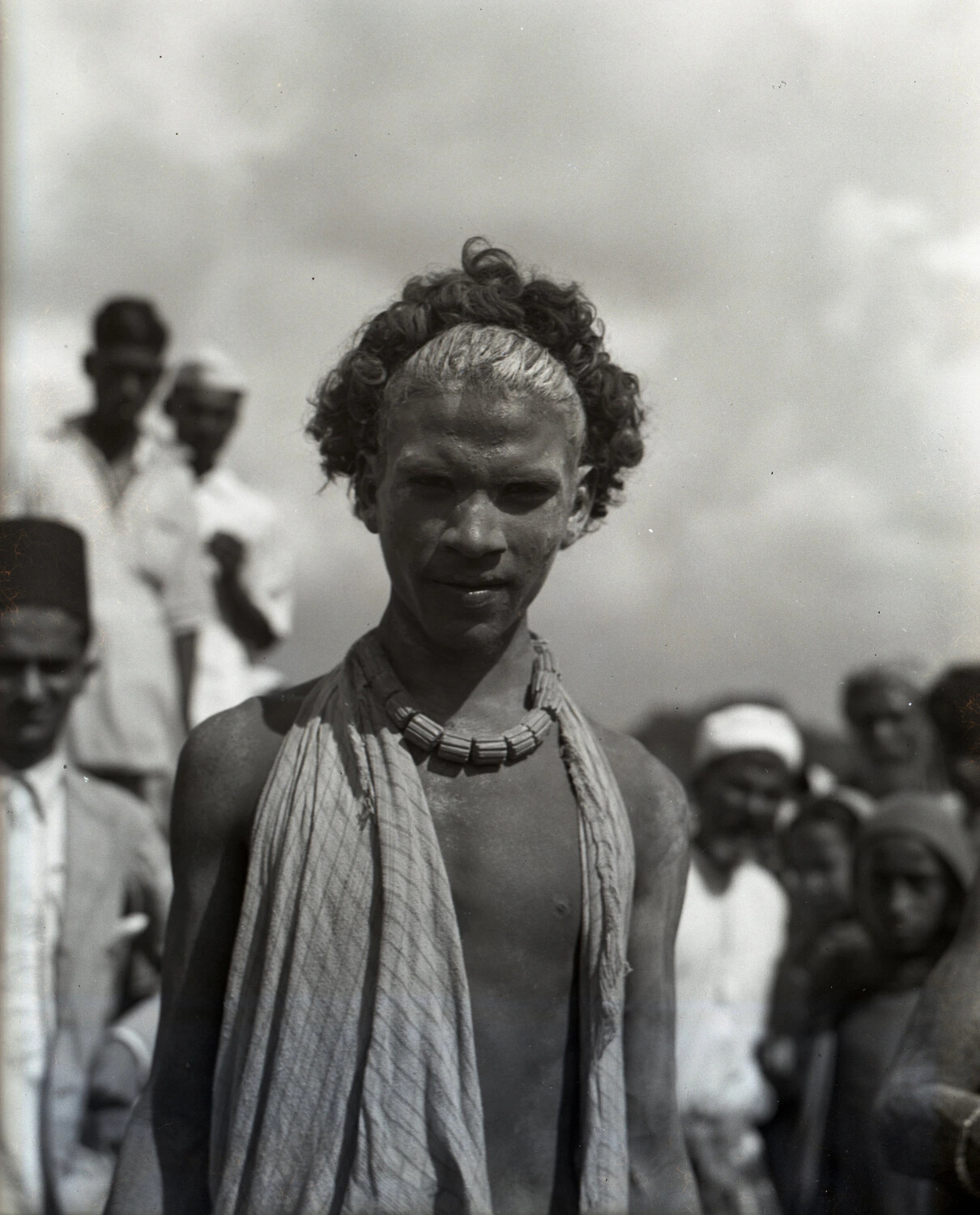 Portrait of Local Man with Traditional Hairstyle, Likely Red Sea/Aden Region Stopover, WWII CBI Transit