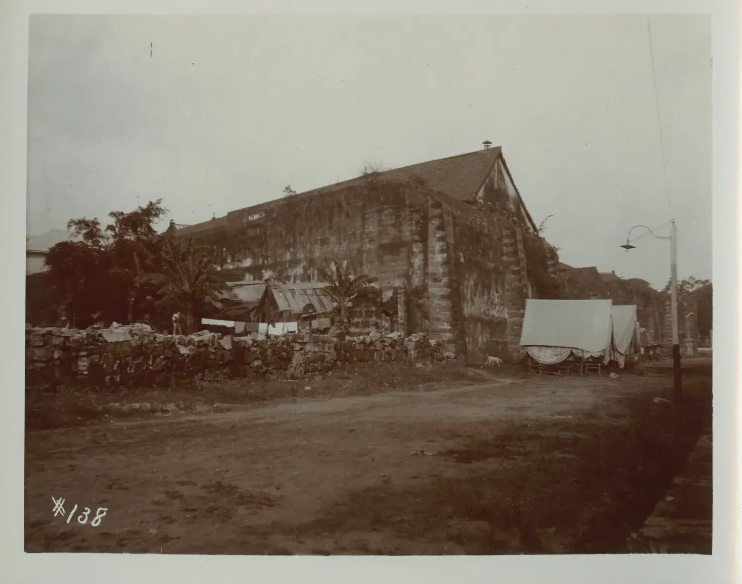 Rear Elevation of Stone Church with Adjacent Tents, Philippines, c. 1890s