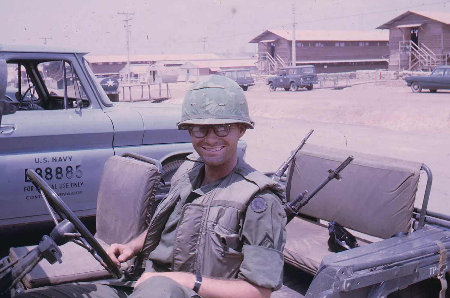 American Serviceman in Jeep at Vietnam Base Camp, Tet Offensive Era, 1968