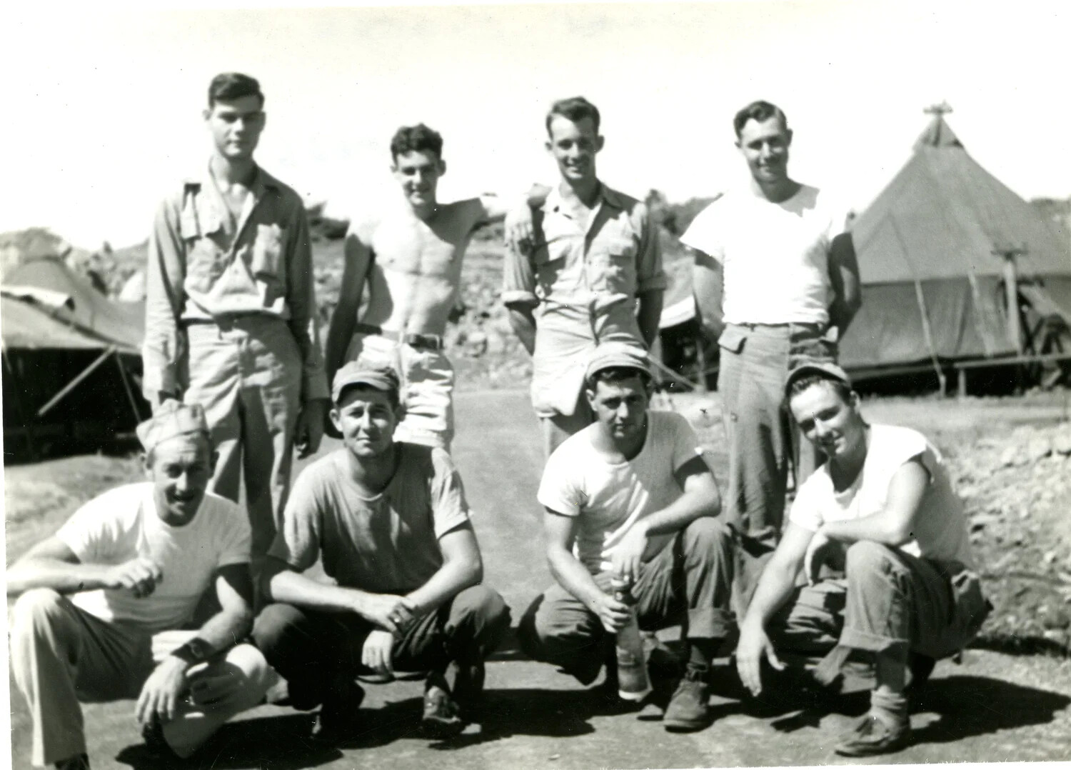 Group Portrait of U.S. Marines at Tented Encampment, 5th Marine Division, Iwo Jima Campaign, 1945