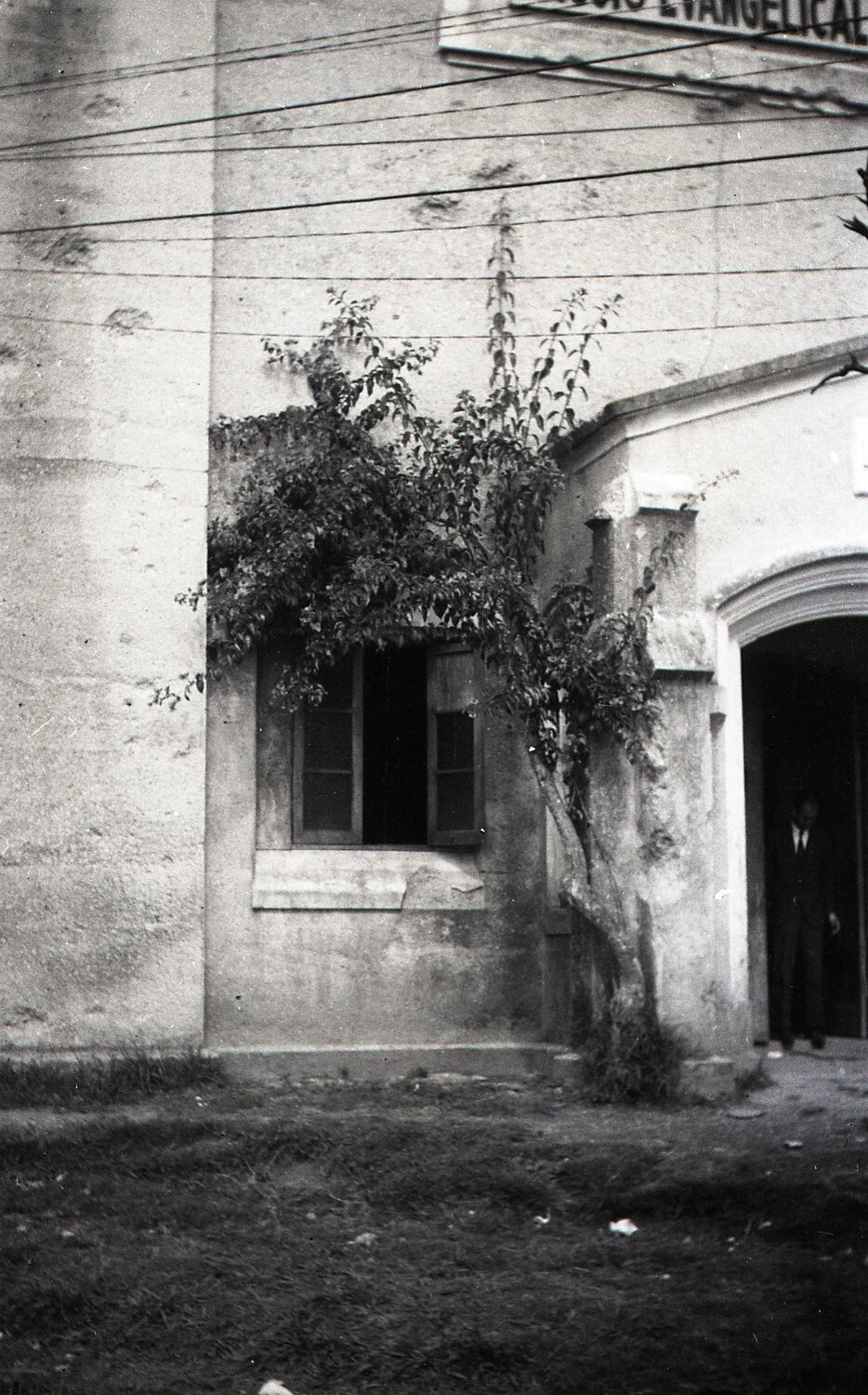 Side Entrance of Baguio Evangelical Church with Figure in Doorway, Luzon, Philippines