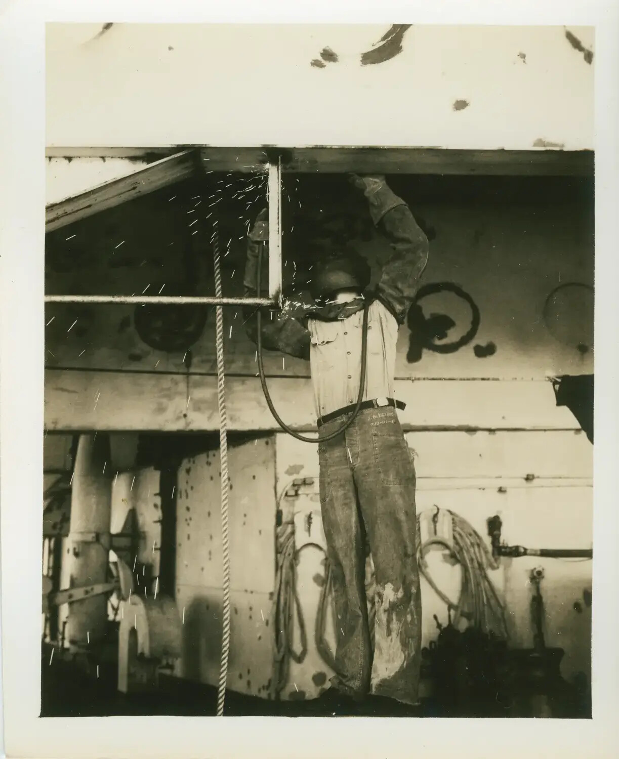 Shipfitter Welding Overhead Aboard USS Petrof Bay (CVE-80)