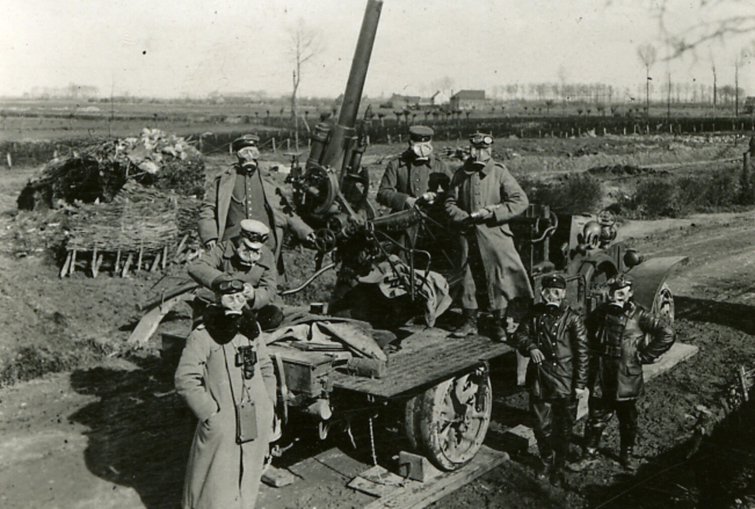 German Field Artillery Crew in Gas Masks with Heavy Howitzer, World War I Era