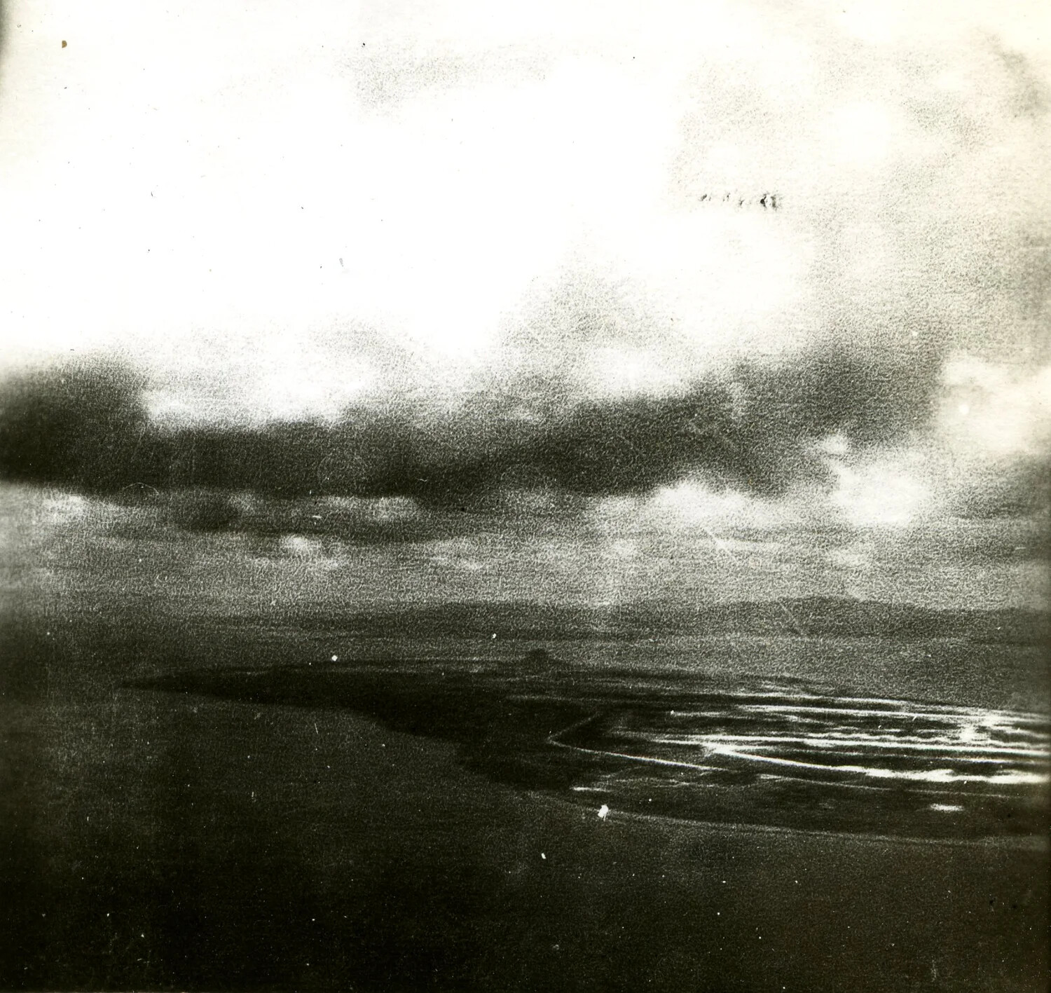 Aerial View of Coastline and Reef from Aircraft, with Formation Aircraft Visible