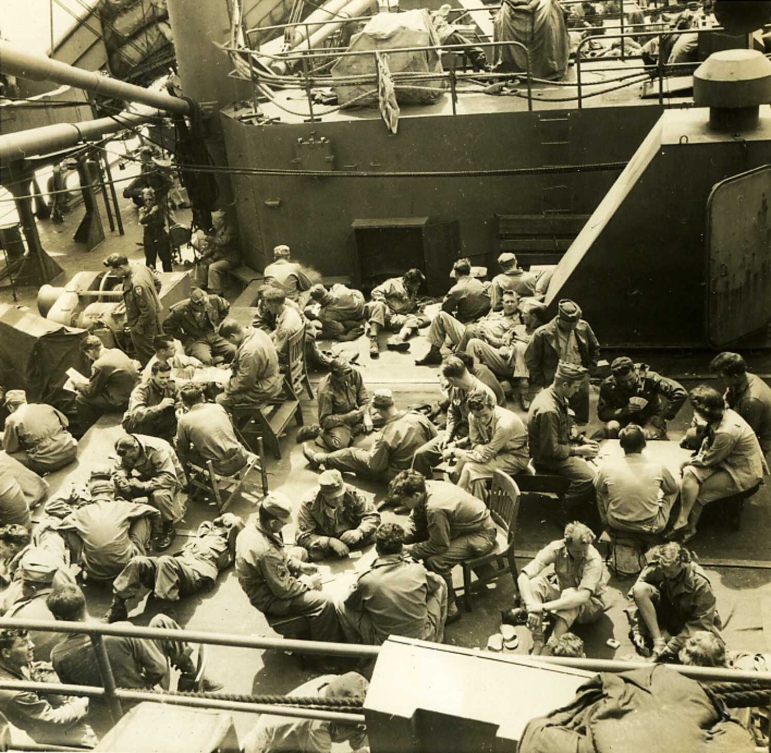 American Servicemen Relaxing on Deck of Troop Transport, Postwar Pacific Crossing