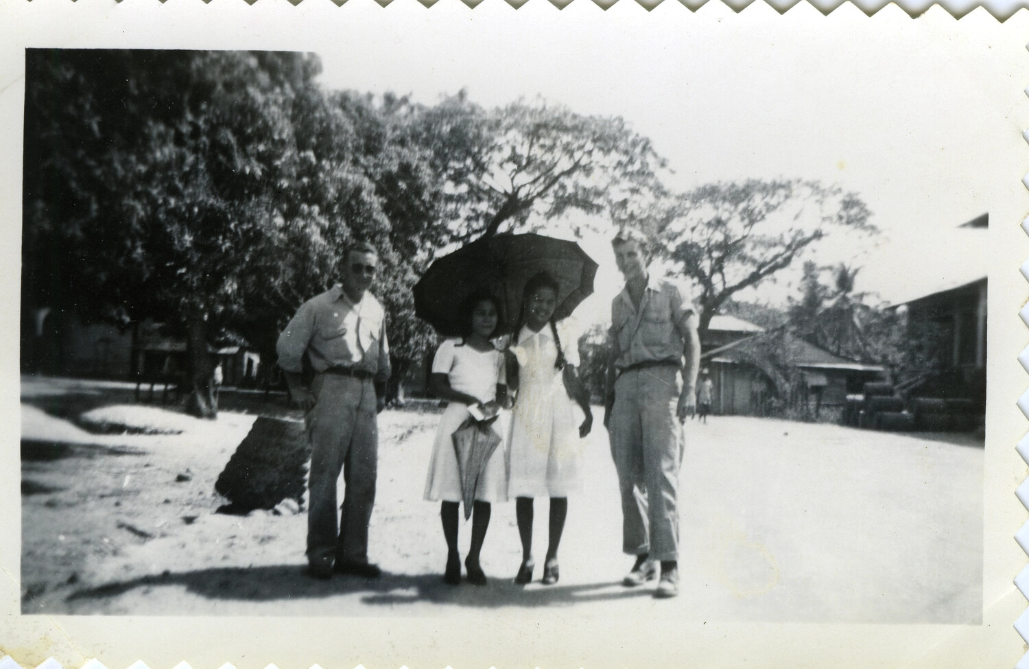 American Servicemen with Local Girls on Village Street, Okinawa, Postwar Pacific Theater