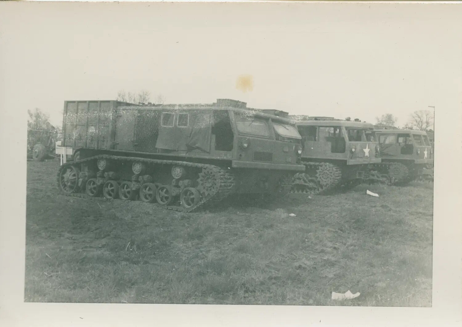 Line of U.S. Army Tracked Support Vehicles, WWII, 579th Bomb Squadron Collection