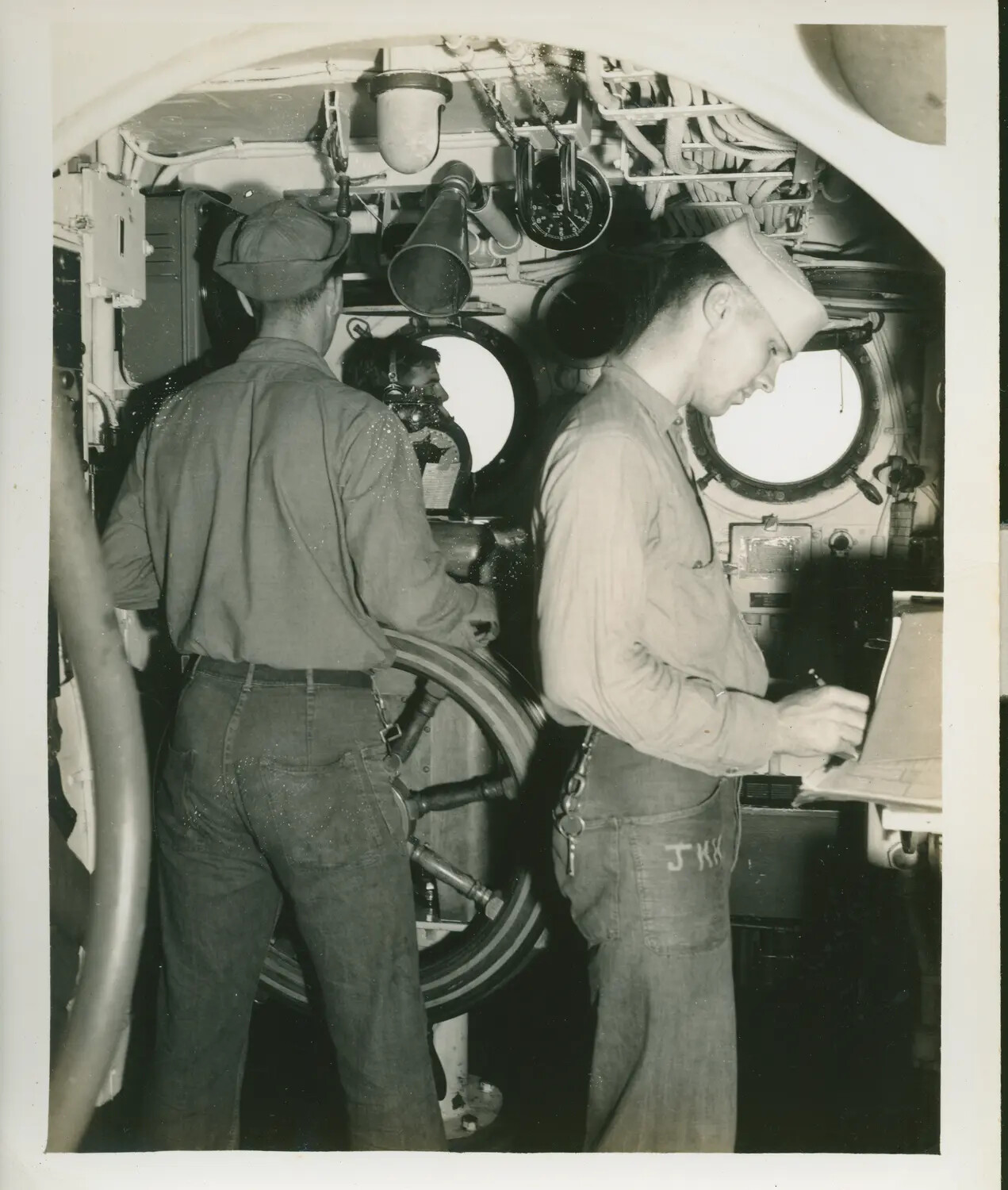 Pilothouse Interior with Helmsman and Navigator, USS Petrof Bay (CVE-80), World War II