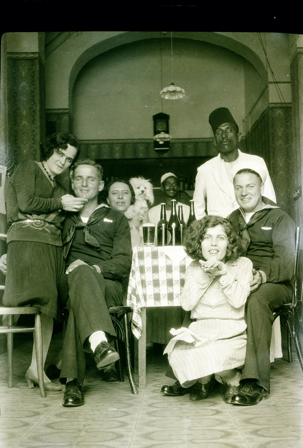 U.S. Navy Sailors and Companions at a Café, Pre-WWII Port of Call, 1930s