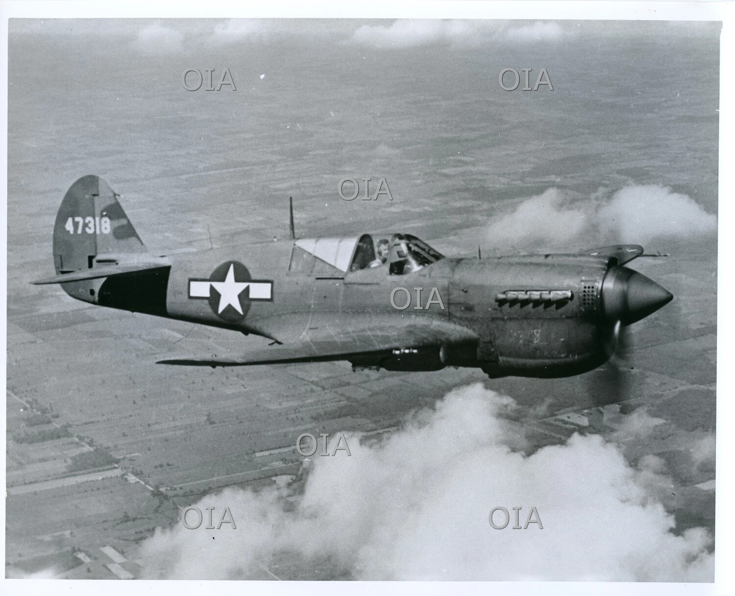 Curtiss P-40N Warhawk in Flight, Tail Number 47318, U.S. Army Air Forces