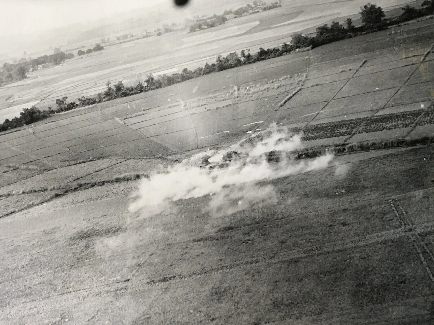 Aerial View of Fresh Explosion and Smoke Following Low-Altitude Strike on Rural Target