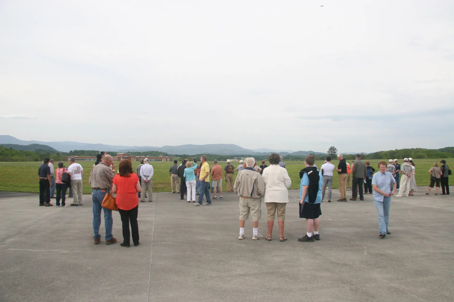 Crowd Gathered on Airport Ramp Watching Flyover - Operation Tailwind Reunion Event