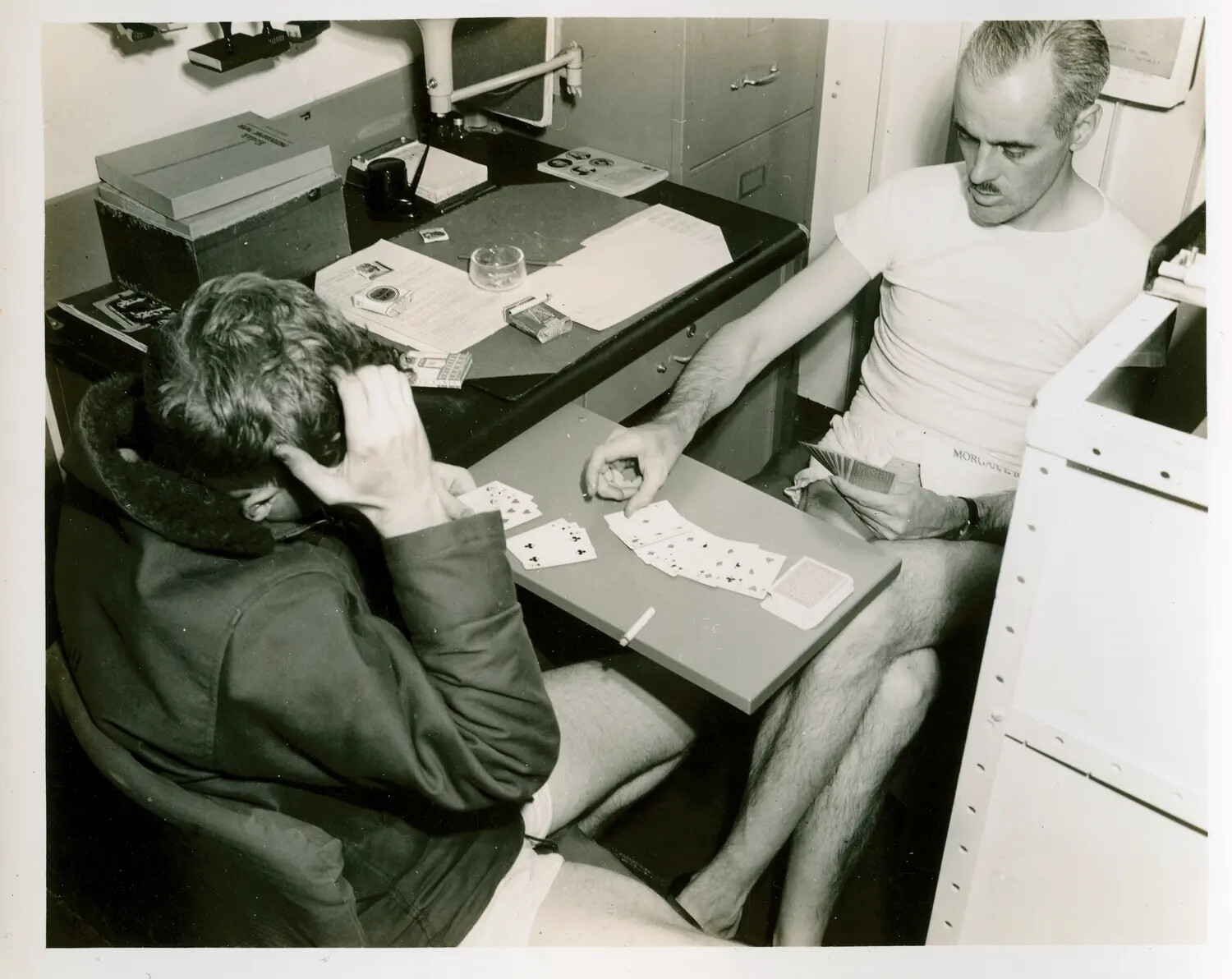 Sailors Playing Cards Below Decks Aboard USS Petrof Bay (CVE-80)