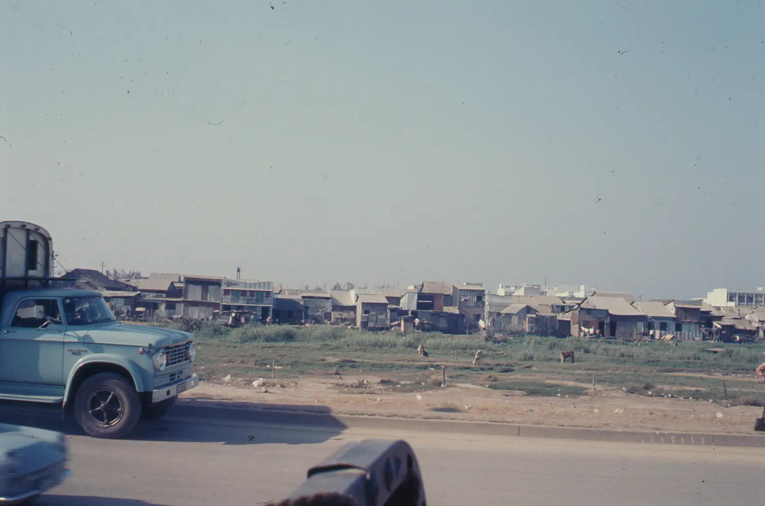 Street Scene with Truck and Vietnamese Township, Tet Offensive Period, 1968