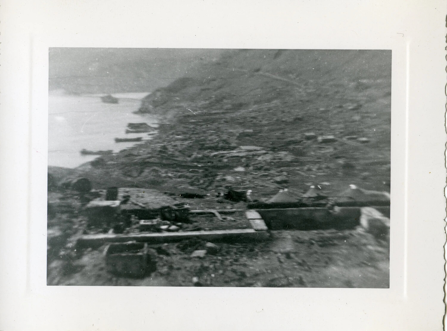 Elevated View of Wrecked Equipment on Sled Overlooking Harbor, Aleutian Islands, 1943