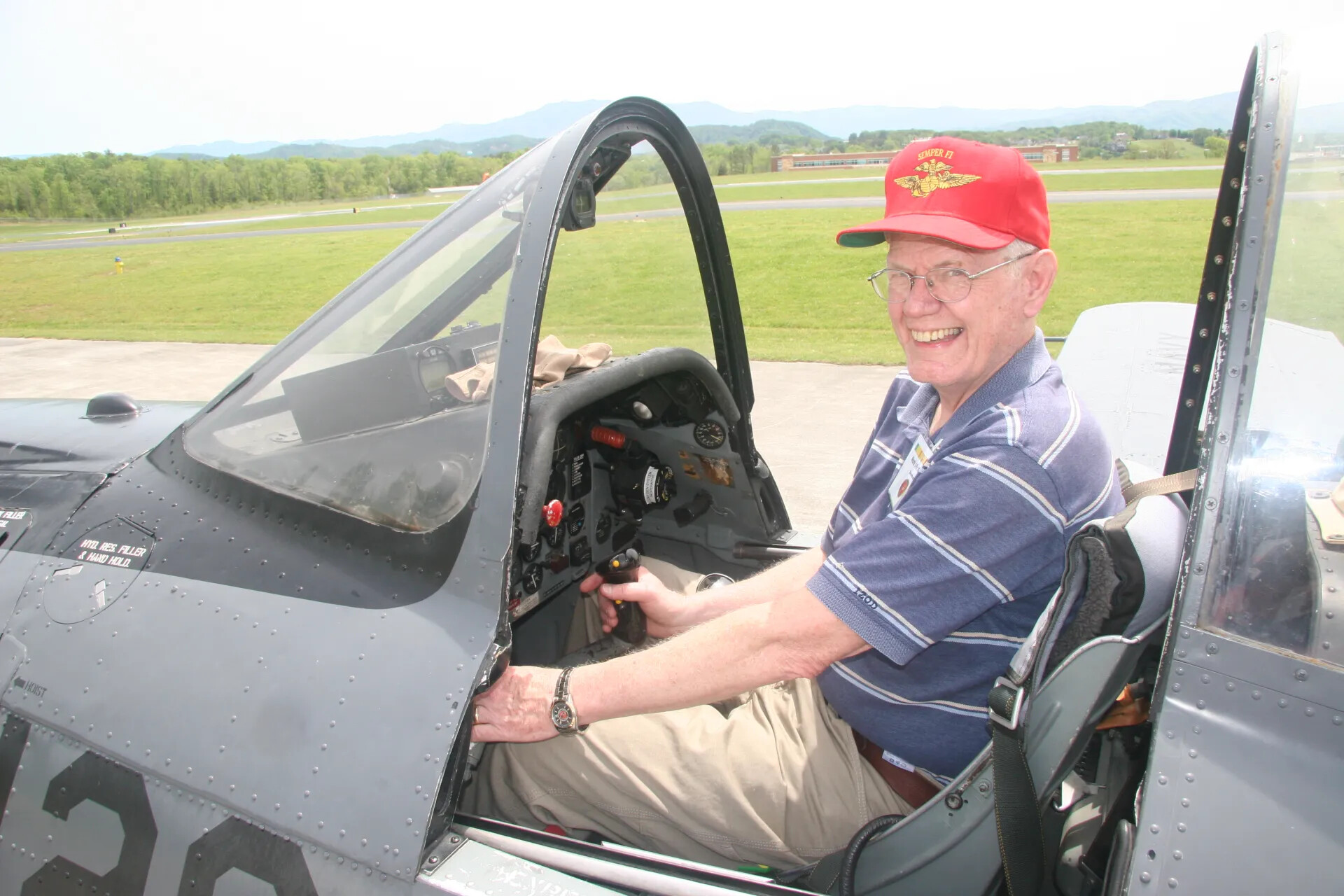 Marine Corps Veteran in Cockpit of Restored Trainer Aircraft, Operation Tailwind Reunion, April 30, 2016