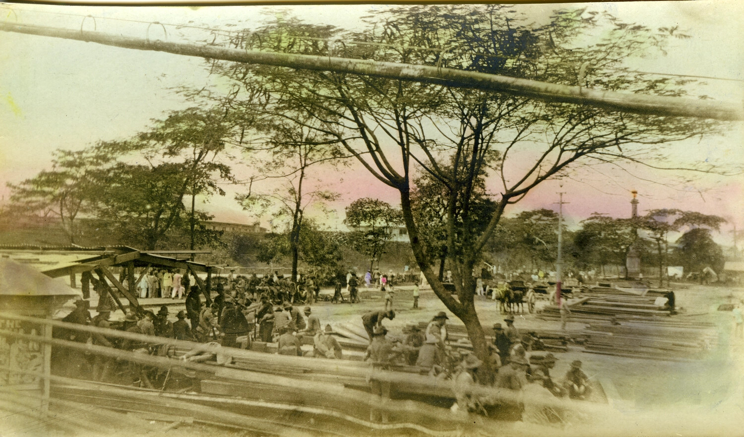 Street Scene with Lumber Yard and Gathered Workers, Philippines, Early 1900s