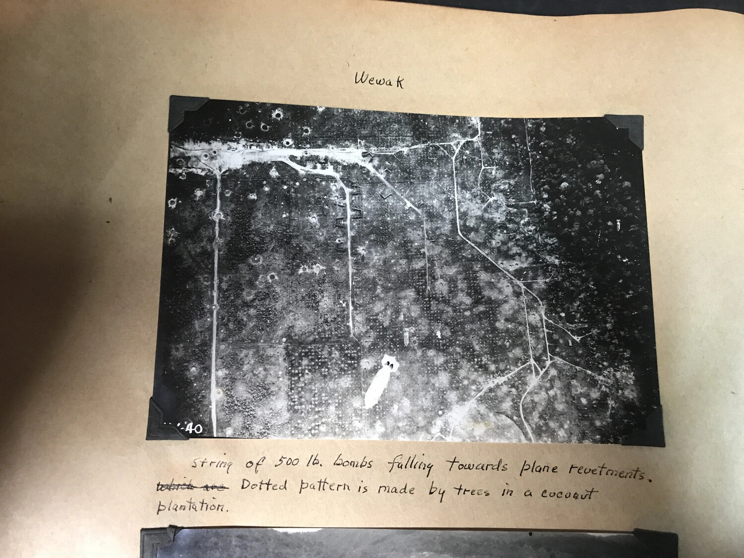 Album Page: 'Wewak' - String of 500-lb Bombs Falling on Plane Revetments with Handwritten Notes