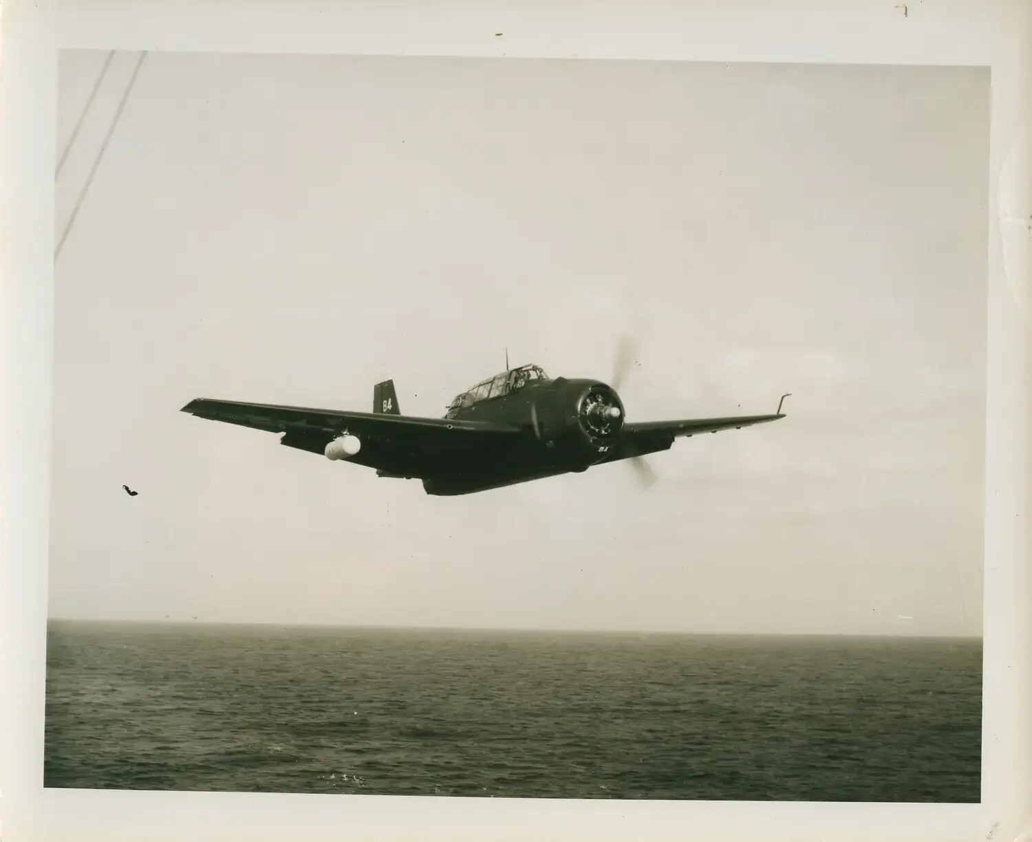 Grumman TBM/TBF Avenger '84' in Flight Over the Pacific, USS Petrof Bay (CVE-80) Air Group, WWII