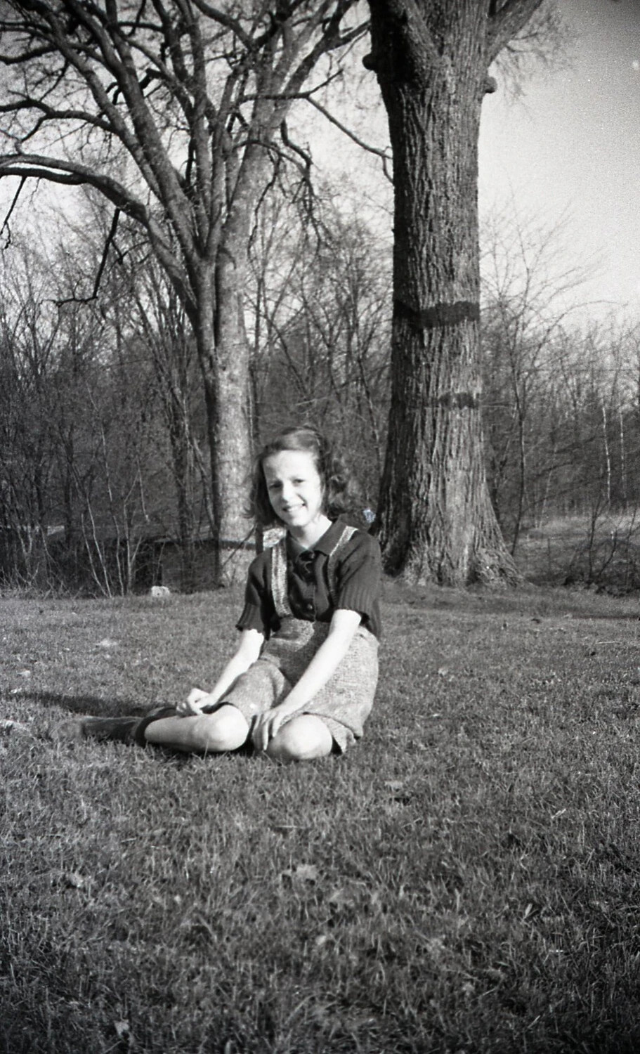 Portrait of a Young Girl Seated on Lawn, New England, 1940s