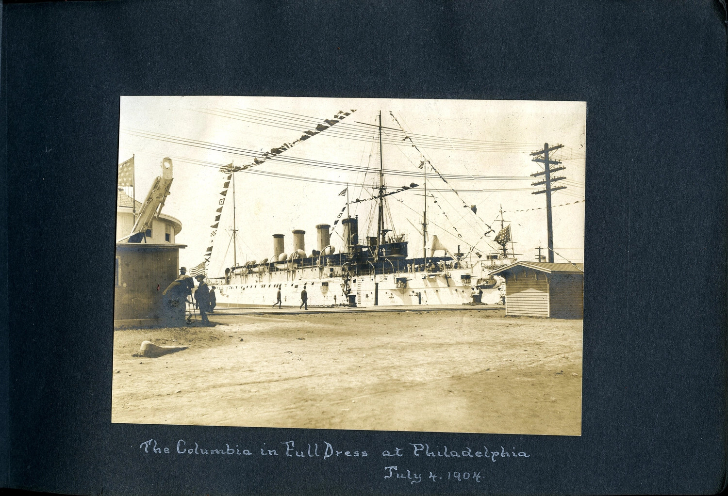 USS Columbia (C-12) Dressed Overall for Independence Day, Philadelphia Navy Yard, July 4, 1904