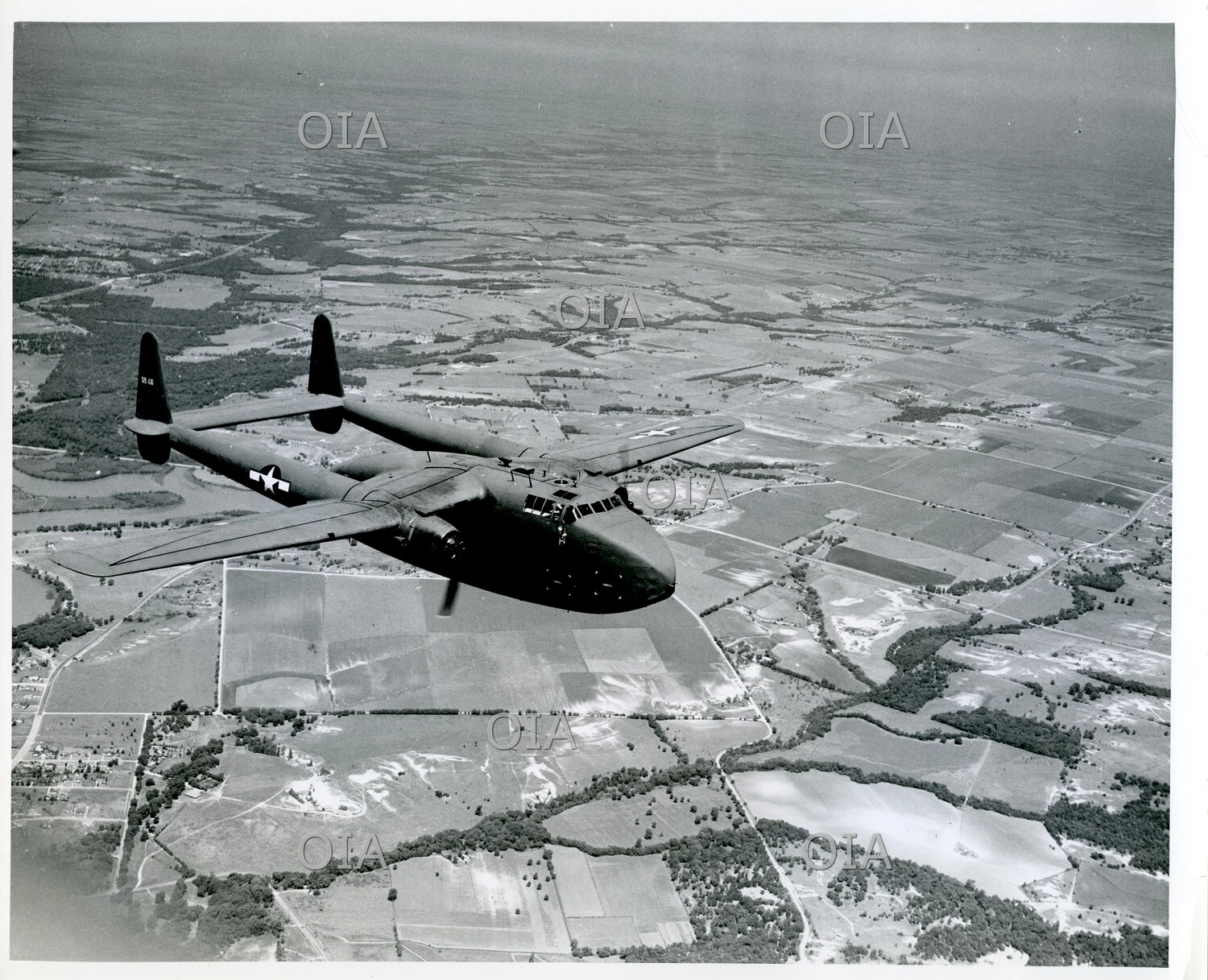 Fairchild Twin-Boom Cargo Transport (C-82 Packet / C-119-type) in Flight Over Farmland