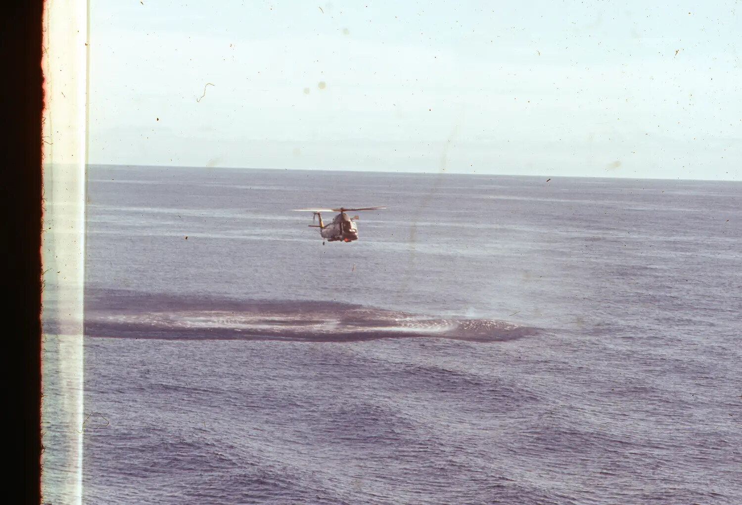 Plane Guard Helicopter Hovering Over Ocean, Vietnam War Era