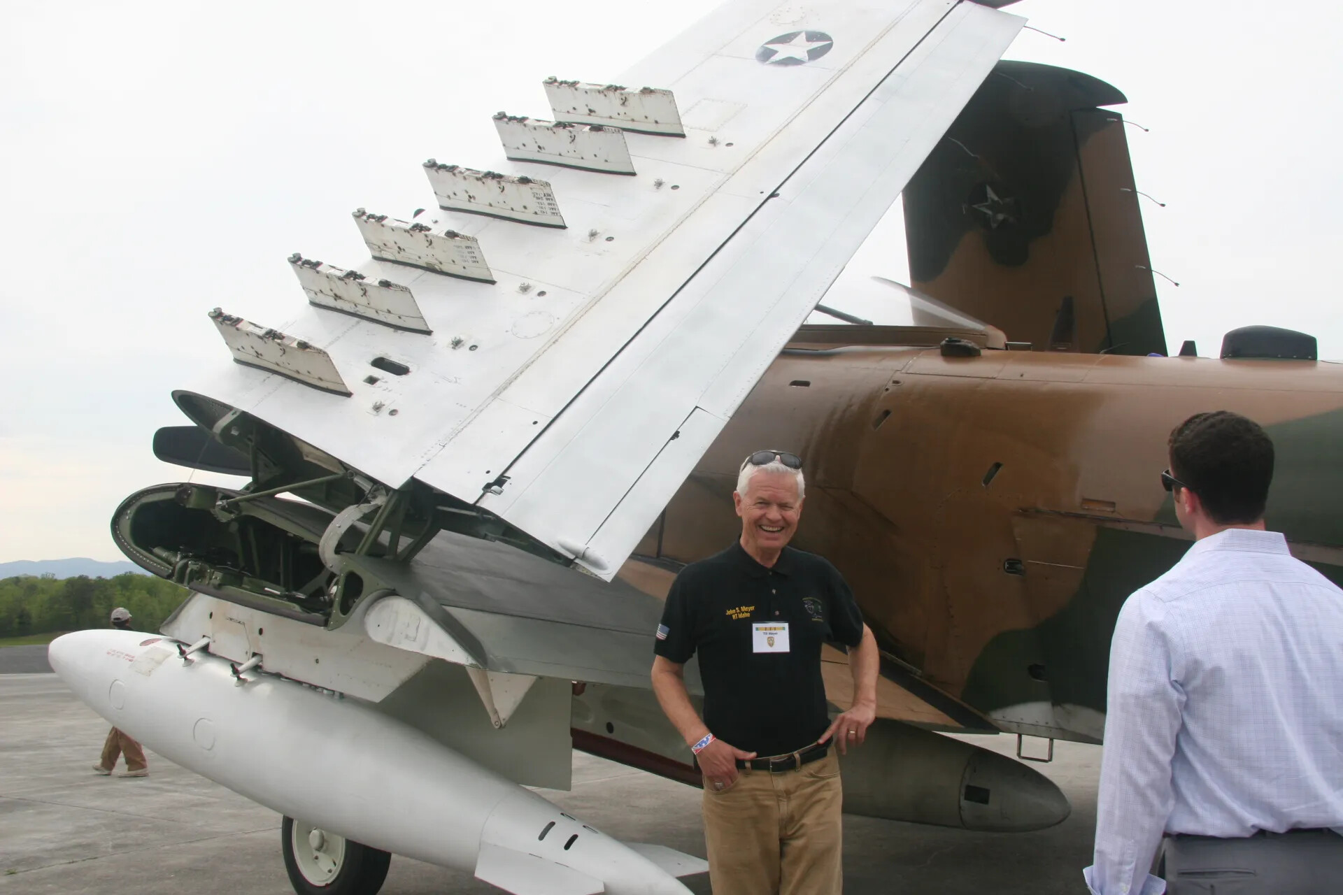 Attendee 'John S. Meyer, RT Idaho' Beside Douglas A-1 Skyraider Wing, Reunion Event