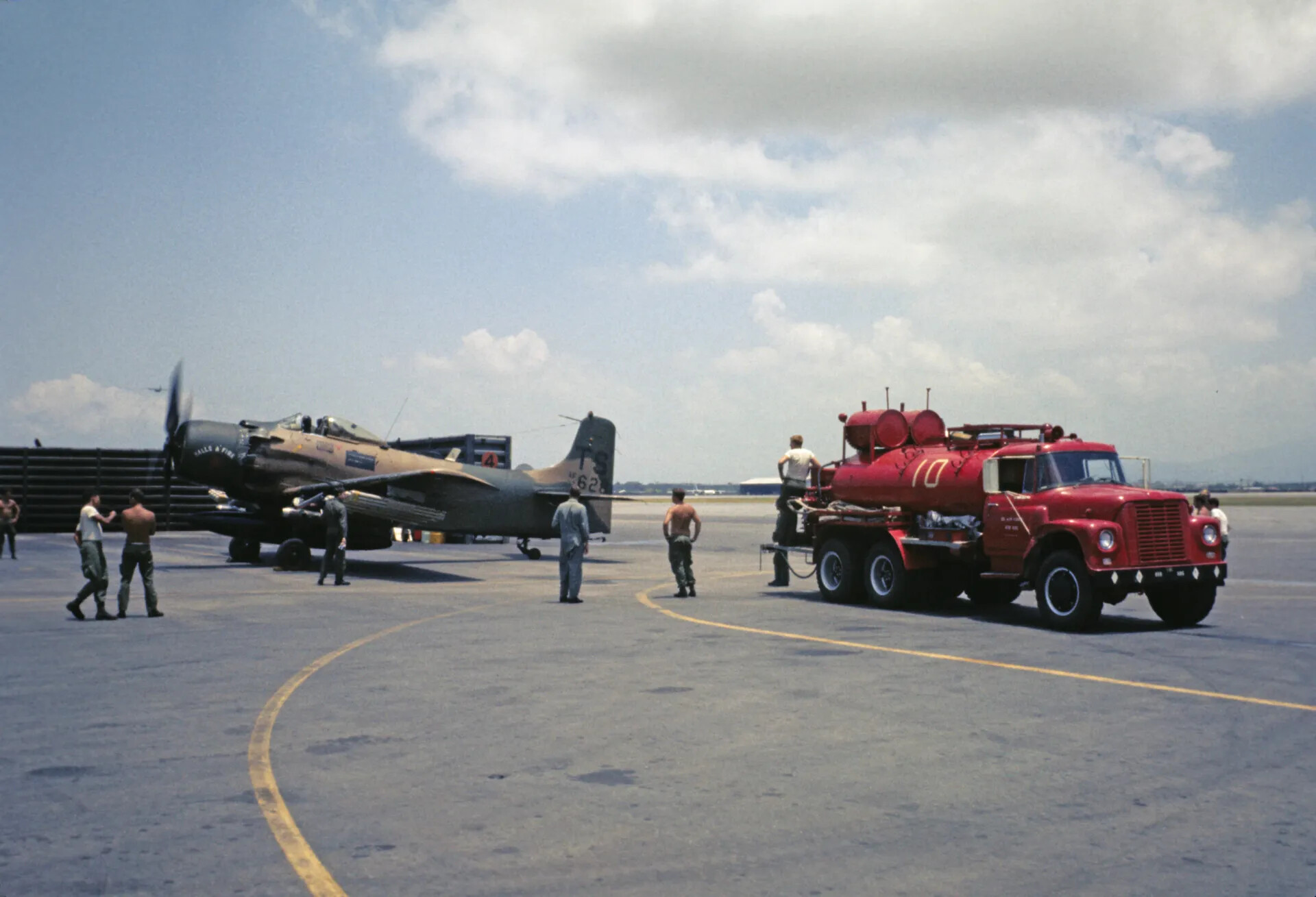 A-1 Skyraider 'Balls A'Fire' (TS/AF-628) Beside Fire Truck No. 10, Vietnam War Era