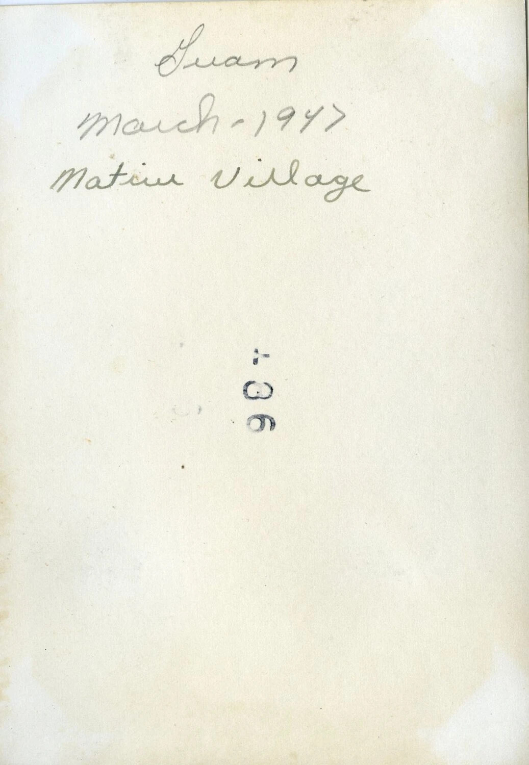 Verso of Photo Album Page with Handwritten Caption: 'Guam, March 1947, Matiu Village'