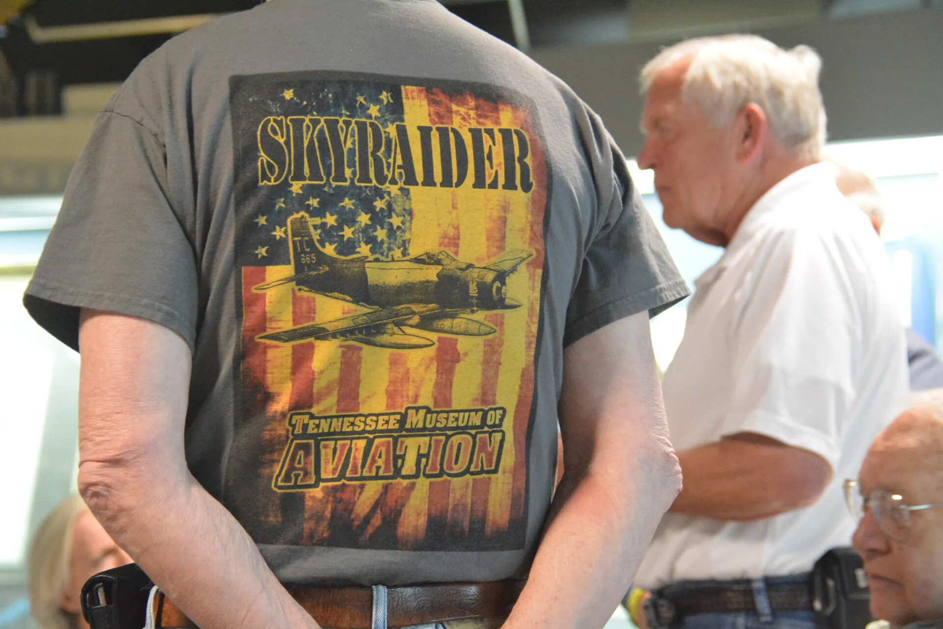 Commemorative "Skyraider" T-Shirt Graphic with Attendees in Background, Tennessee Museum of Aviation Reunion, 2 May 2015