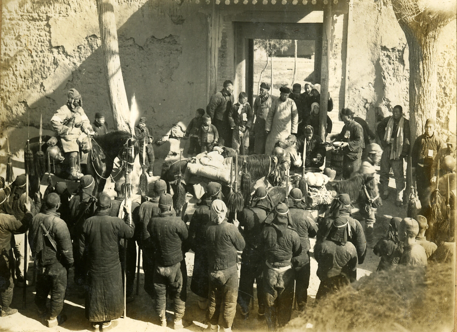 Mounted Official and Armed Escort at a Walled Compound Gate, China/Manchuria