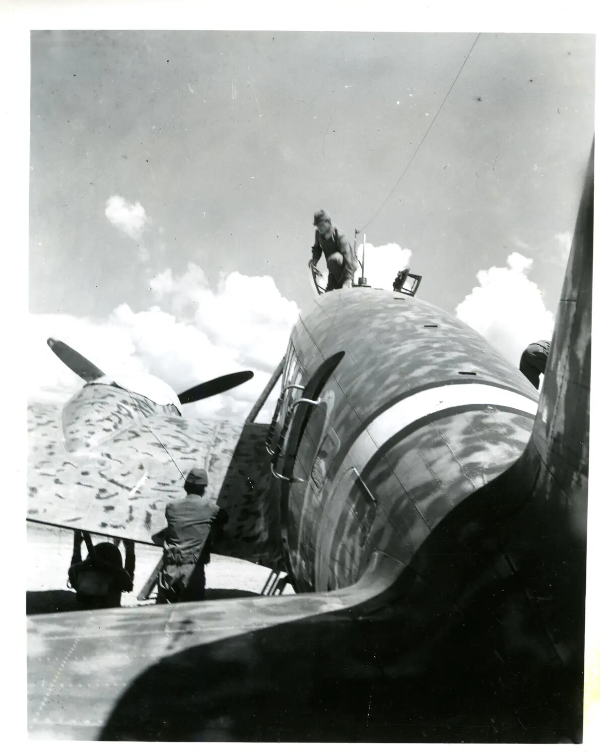 Ground Crew Servicing Camouflaged C-46 Commando Transport Aircraft, CBI Theater, WWII