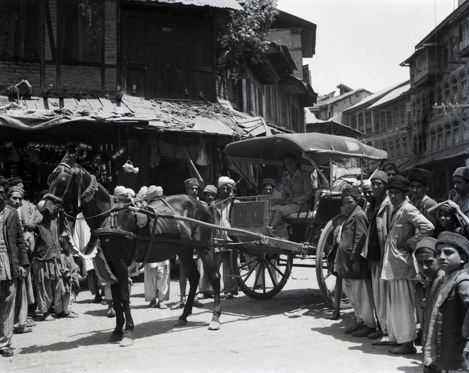 Horse-Drawn Tonga and Crowd in a Kashmir Market Street, WWII China-Burma-India Theater