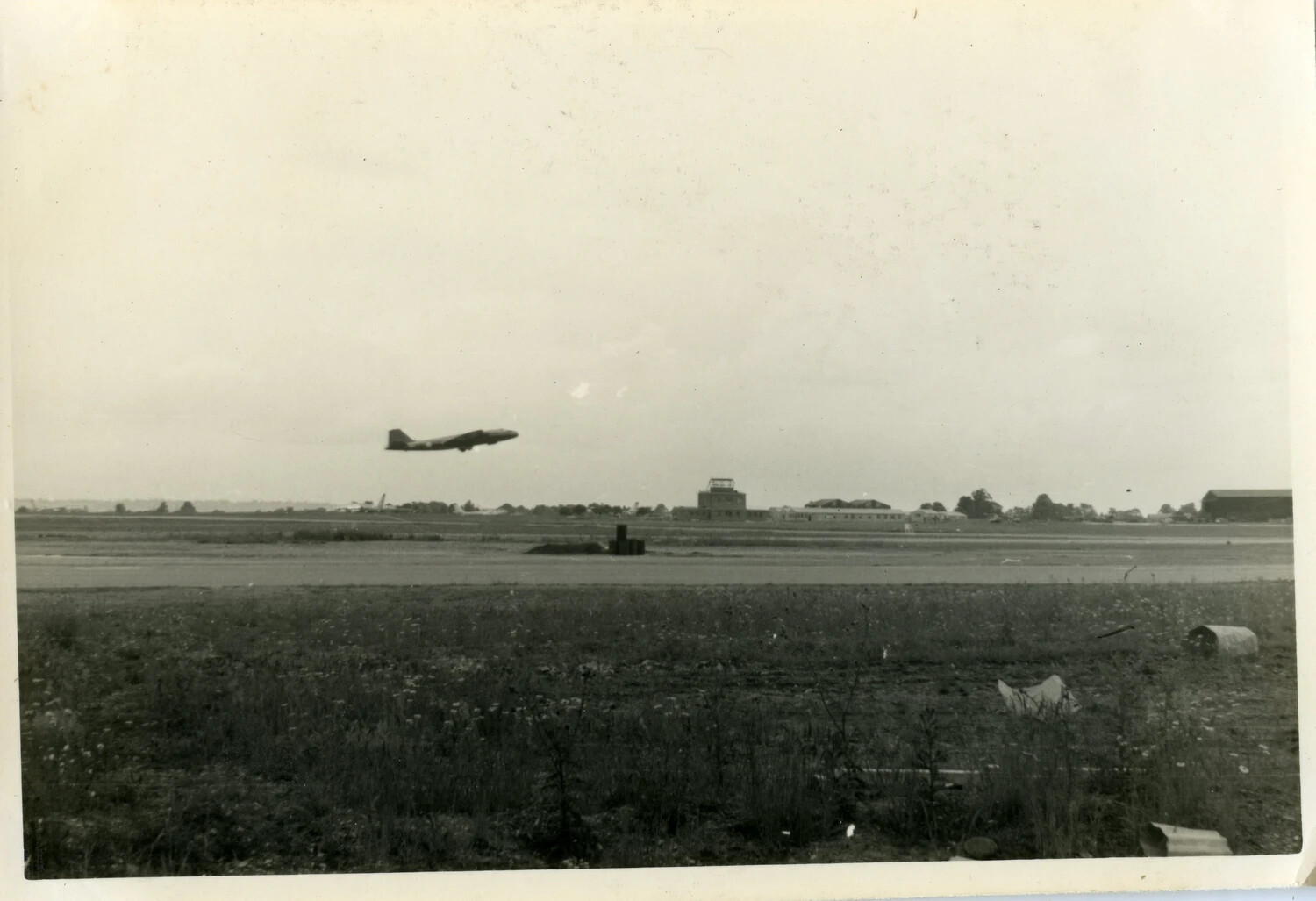 Swept-Wing Jet Bomber Departing Airfield Runway, Cold War-Era U.S. Air Force Base