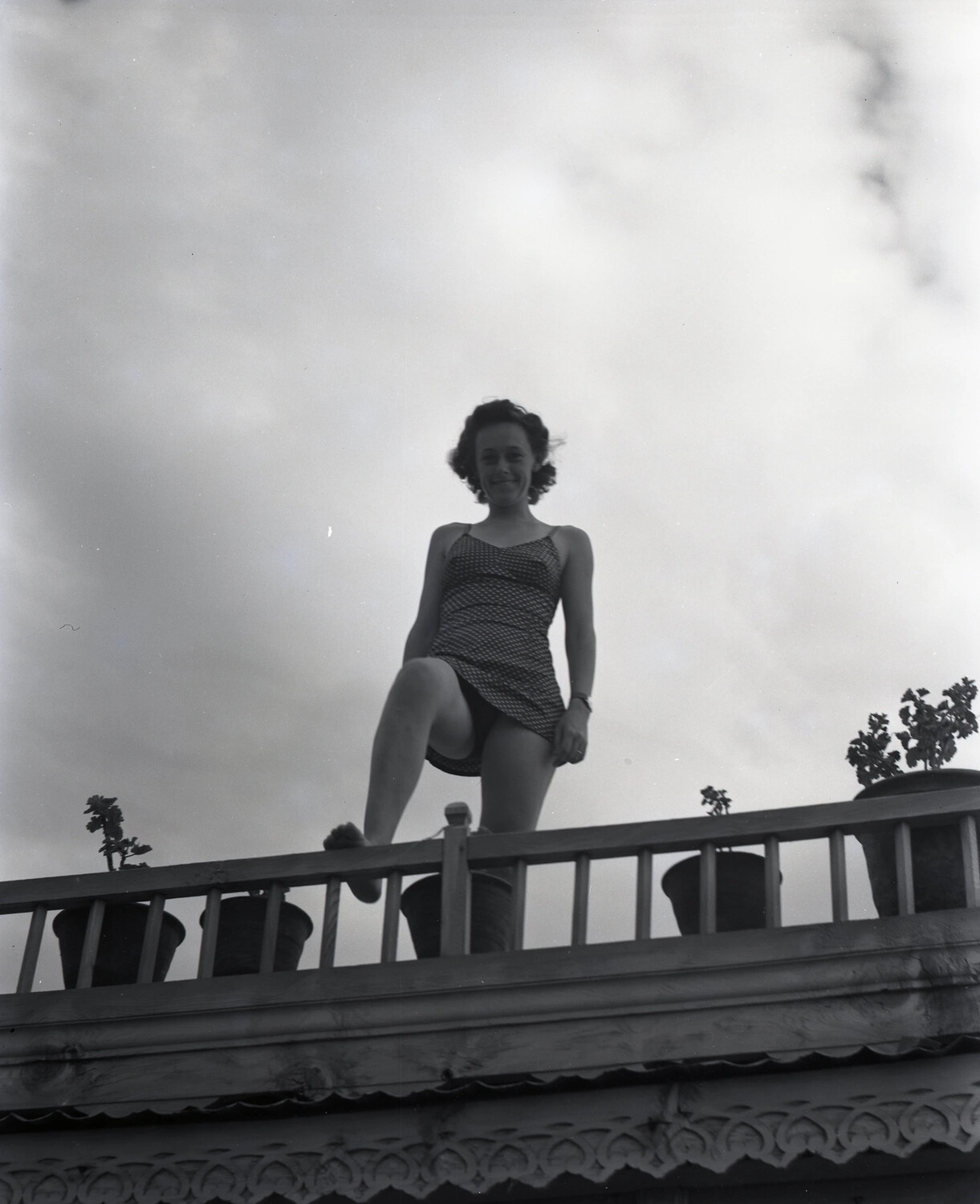 Woman Posing on a Carved Balcony Railing, Kashmir, WWII-Era R&R Photograph