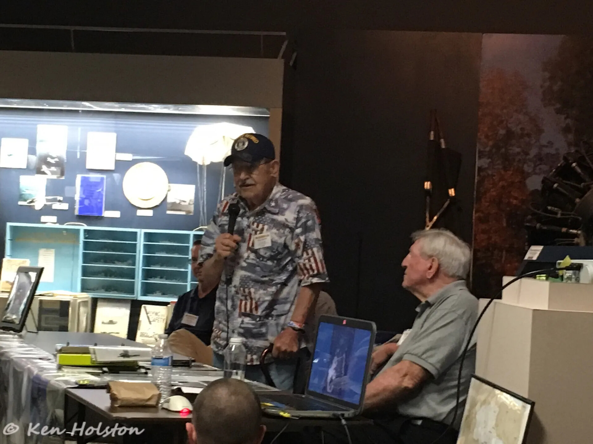 Veteran Speaking at Podium During Tailwind Day Redux Reunion Event