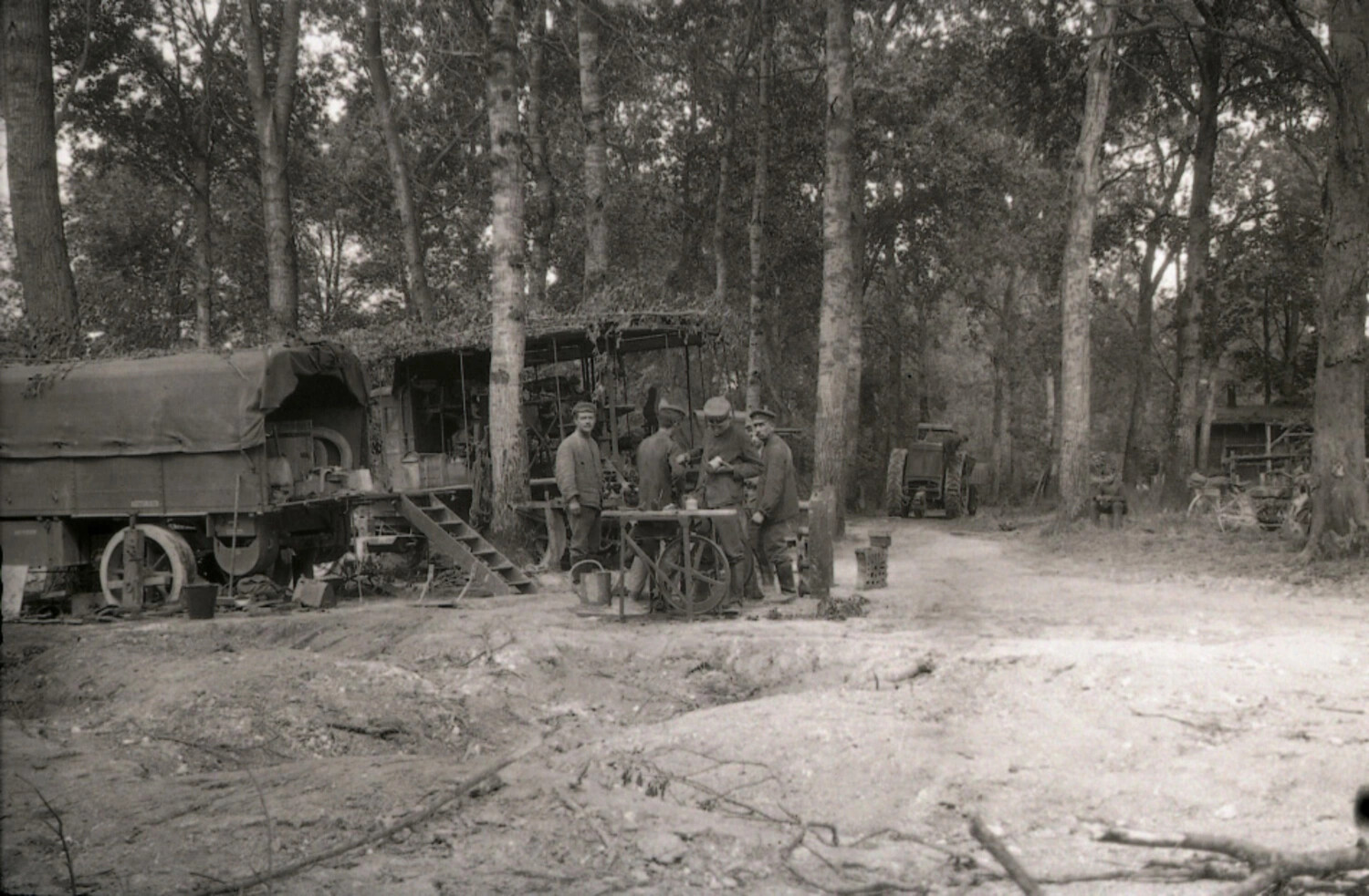 German Military Workshop Unit in Camouflaged Forest Encampment, WWI