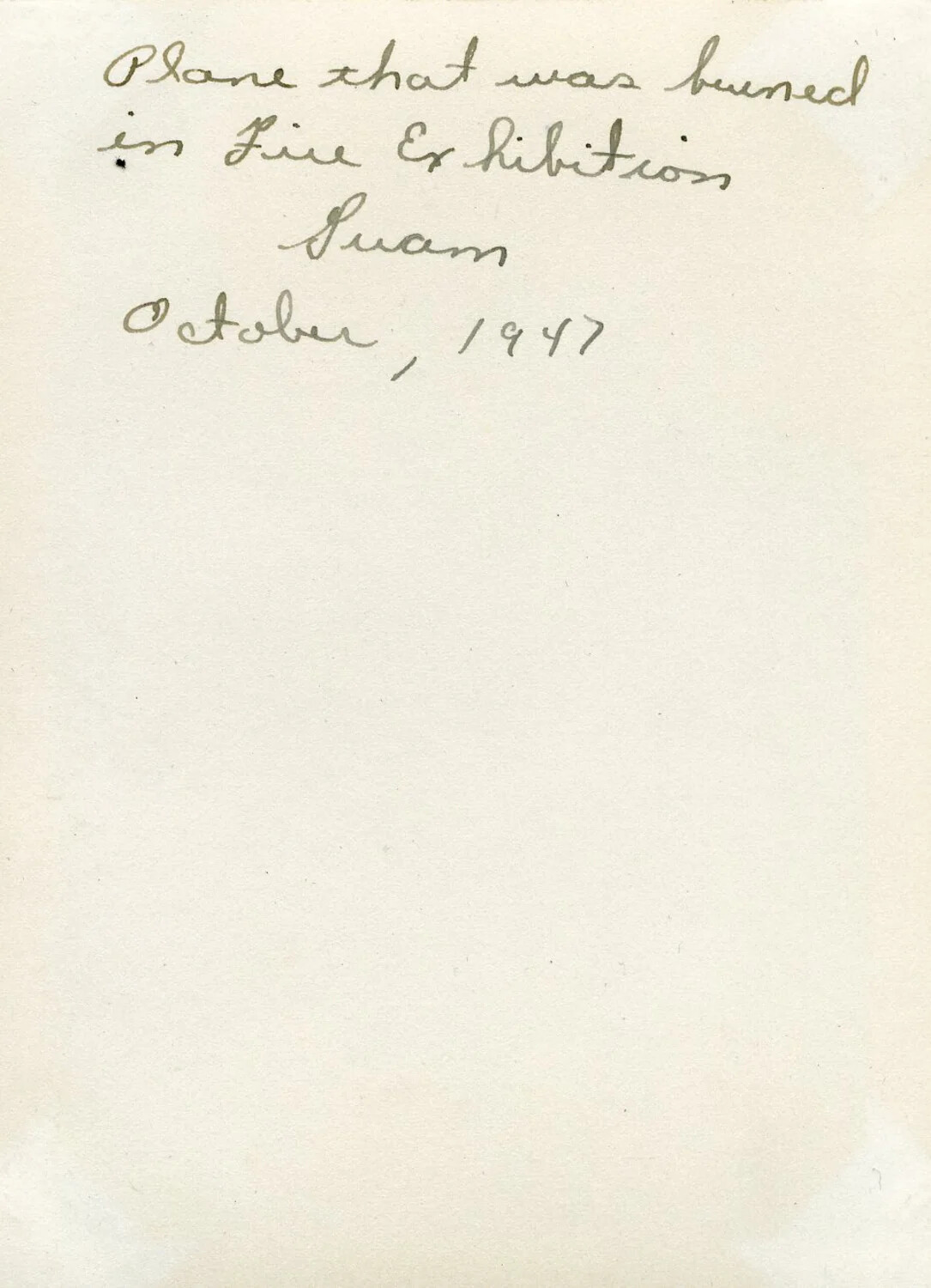 Handwritten Album Caption: 'Plane That Was Burned in Fire Exhibition, Guam, October 1947' (VR-6 Album)