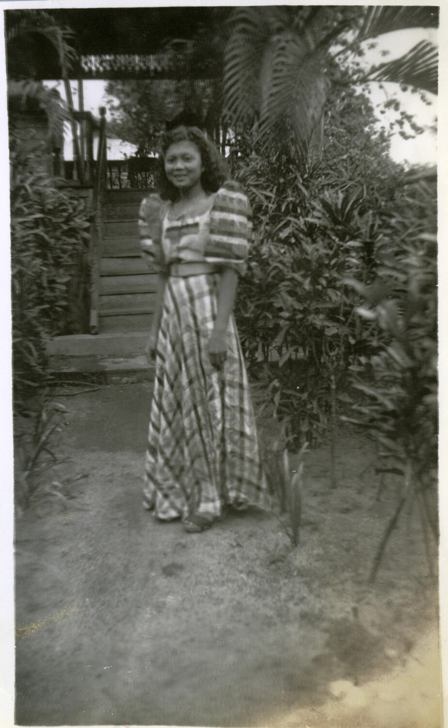 Young Woman in Traditional Butterfly-Sleeve Dress, Pacific Theater, World War II Era